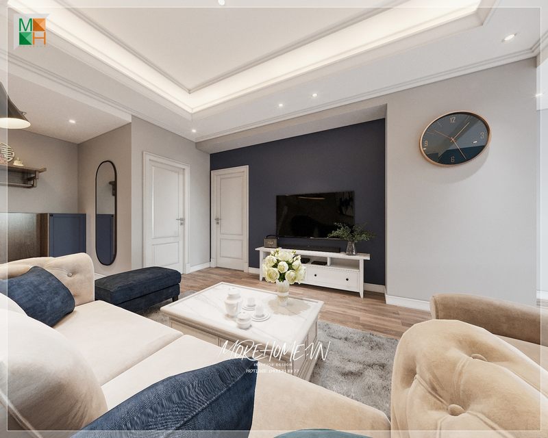 Phòng khách chung cư hiện đại với sofa nỉ, bàn trà và kệ tivi màu trắng sang trọng