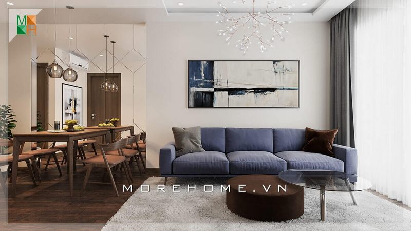 Mẫu thiết kế phòng ăn liền phòng khách, với bộ bàn ăn sử dụng gỗ tự nhiên phong cách hiện đại tối giản, kết hợp cùng ghế sofa văng bọc nỉ, mang lại không gian sinh hoạt trẻ trung hiện đại cho gia chủ